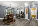 Open concept kitchen and dining area featuring stainless steel appliances and modern finishes at 4306 Thorngate Ln, Acworth, GA 30101