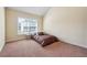 Bedroom with a minimalist design and natural light from the window at 7514 Absinth Dr Pass, Atlanta, GA 30349