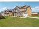 Attractive two-story home with a well-kept lawn and a two-car garage, showcasing curb appeal at 7514 Absinth Dr Pass, Atlanta, GA 30349