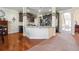 Spacious kitchen featuring granite countertops, dark cabinetry, and an open design at 7514 Absinth Dr Pass, Atlanta, GA 30349
