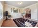 Inviting living room area with carpet, neutral walls and an adjacent dining room at 7514 Absinth Dr Pass, Atlanta, GA 30349