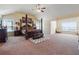 Spacious main bedroom featuring a four-poster bed and plenty of natural light at 7514 Absinth Dr Pass, Atlanta, GA 30349