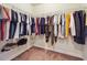 Walk-in closet providing ample storage space for clothing and accessories at 7514 Absinth Dr Pass, Atlanta, GA 30349
