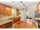 Well-equipped kitchen featuring granite countertops, stainless steel appliances, and hardwood floors at 79 Tiffany Trce, Palmetto, GA 30268