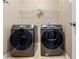 Convenient laundry room equipped with a modern Samsung washer and dryer set at 79 Tiffany Trce, Palmetto, GA 30268