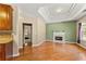 Bright living room with hardwood floors, fireplace and trey ceiling details for an elegant touch at 79 Tiffany Trce, Palmetto, GA 30268