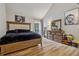 Spacious bedroom with a vaulted ceiling, hardwood floors, and neutral walls at 1720 Little Willeo Rd, Marietta, GA 30068