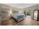 Bright, spacious main bedroom with a private balcony at 1720 Little Willeo Rd, Marietta, GA 30068