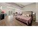 Large bedroom features hardwood floors, ample space, and access to an outdoor balcony at 1720 Little Willeo Rd, Marietta, GA 30068
