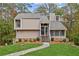 Charming two-story home featuring a landscaped front yard and inviting entrance at 1720 Little Willeo Rd, Marietta, GA 30068