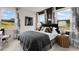 Cozy bedroom features two windows, a dark accent wall, and unique decor at 3048 Shirecrest Ln, Dacula, GA 30019