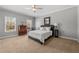 Bedroom featuring a double bed, neutral colors, and a ceiling fan at 3230 Munsey Ct, Cumming, GA 30041