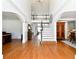 Spacious foyer with hardwood floors, staircase, and high ceilings at 3230 Munsey Ct, Cumming, GA 30041