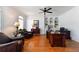 Elegant office with hardwood floors, built-in bookshelves, and crown molding at 3230 Munsey Ct, Cumming, GA 30041