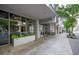 The Plaza Midtown entrance with modern architecture and landscaping at 44 Peachtree Nw Pl # 629, Atlanta, GA 30309