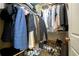 Spacious walk-in closet with organized storage for clothing and shoes at 44 Peachtree Nw Pl # 629, Atlanta, GA 30309