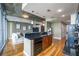 Open concept kitchen with sleek countertops, and stainless steel appliances at 44 Peachtree Nw Pl # 629, Atlanta, GA 30309