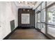 Modern lobby with stylish decor, artwork, and light fixtures at Peachtree Place at 44 Peachtree Nw Pl # 629, Atlanta, GA 30309