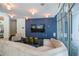 Relaxing lounge with large TV, comfortable seating, and stylish decor at 44 Peachtree Nw Pl # 629, Atlanta, GA 30309