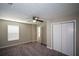 Bedroom with neutral paint, carpet and closet and connecting bathroom at 5660 Sable Bay Pt, Atlanta, GA 30349