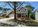 Charming brick home with two-car garage, manicured yard, mature shade trees, and great curb appeal at 5660 Sable Bay Pt, Atlanta, GA 30349