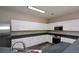Spacious and modern kitchen with stainless steel appliances, a gas range, and plenty of white cabinets at 5660 Sable Bay Pt, Atlanta, GA 30349