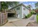 Back exterior featuring a wood deck, backyard, and driveway providing convenient parking at 638 Cooledge Ne Ave, Atlanta, GA 30306