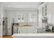Modern kitchen with stainless steel appliances, granite countertops, and white cabinetry at 638 Cooledge Ne Ave, Atlanta, GA 30306