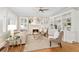 Bright living room featuring a fireplace, built-in shelving, hardwood floors, and lots of natural light at 638 Cooledge Ne Ave, Atlanta, GA 30306