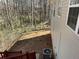 View of backyard with walkout deck and stairs at 120 Grove Ln, Temple, GA 30179