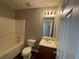 Full bathroom features a shower/tub combination and a single vanity at 120 Grove Ln, Temple, GA 30179
