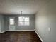 Open dining area with chandelier, tile floors and natural light at 120 Grove Ln, Temple, GA 30179