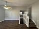Spacious living room with staircase, hardwood floors, and natural light at 120 Grove Ln, Temple, GA 30179