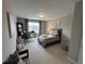 Bright bedroom featuring a twin bed, a desk by the window, and stylish decor at 2702 Wollerton St # 2702, Cumming, GA 30040