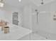 Modern bathroom featuring a spacious glass shower with marble tile and a contemporary shower head, offers a spa-like experience at 345 Sugarview Rd, Sugar Hill, GA 30518