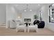Stylish living room featuring a modern fireplace, sophisticated decor, and ample natural light, is great for relaxation at 345 Sugarview Rd, Sugar Hill, GA 30518