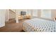 This well-lit bedroom has windows for natural light and hardwood floors at 2020 Rivermont Way, Roswell, GA 30076