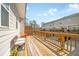 View of the wooden deck with bench seating perfect for relaxing or entertaining at 2020 Rivermont Way, Roswell, GA 30076