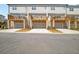Townhomes with lower level garages and upper level decks at 2020 Rivermont Way, Roswell, GA 30076