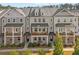 Charming townhomes with covered front porches, perfect for enjoying the outdoors at 2020 Rivermont Way, Roswell, GA 30076