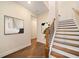 An open staircase leads to the upper level at 2020 Rivermont Way, Roswell, GA 30076
