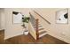 A staircase with wood treads, metal balusters and white risers at 2020 Rivermont Way, Roswell, GA 30076