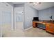 Spacious bedroom with neutral walls, plush carpet, and a convenient built-in desk at 429 Argonne Ter, Canton, GA 30115