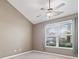 Bright bedroom with neutral carpet and a large window offering pleasant neighborhood views at 429 Argonne Ter, Canton, GA 30115