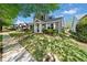Charming two-story home with a well-manicured lawn, lush landscaping, and a welcoming front porch at 429 Argonne Ter, Canton, GA 30115