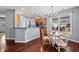 Bright kitchen featuring a dining area and wood flooring with stainless steel appliances at 429 Argonne Ter, Canton, GA 30115