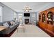 Spacious living room with fireplace, built-in shelves, and comfortable seating area at 429 Argonne Ter, Canton, GA 30115
