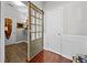 Charming mud room features wood-look tile flooring and a sliding barn door at 429 Argonne Ter, Canton, GA 30115
