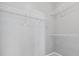 Functional walk-in closet with multiple shelves for organized storage solutions at 429 Argonne Ter, Canton, GA 30115