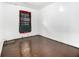 Bedroom features painted hardwood floors and natural light from single window at 814 Welch Sw St, Atlanta, GA 30310